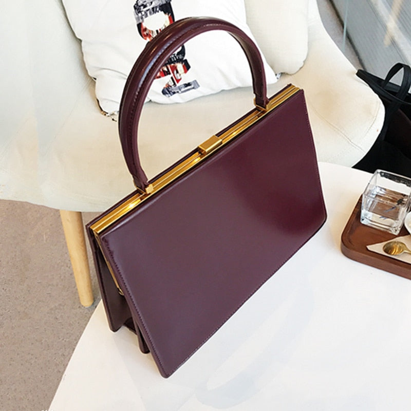 Sleek Burminsa Vintage Clasp Handbag